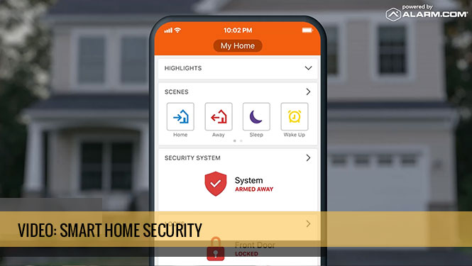 Smartphone displaying Alarm.com app for home security management, featuring system status "Armed Away" and options for home scenes, with a suburban house in the background.